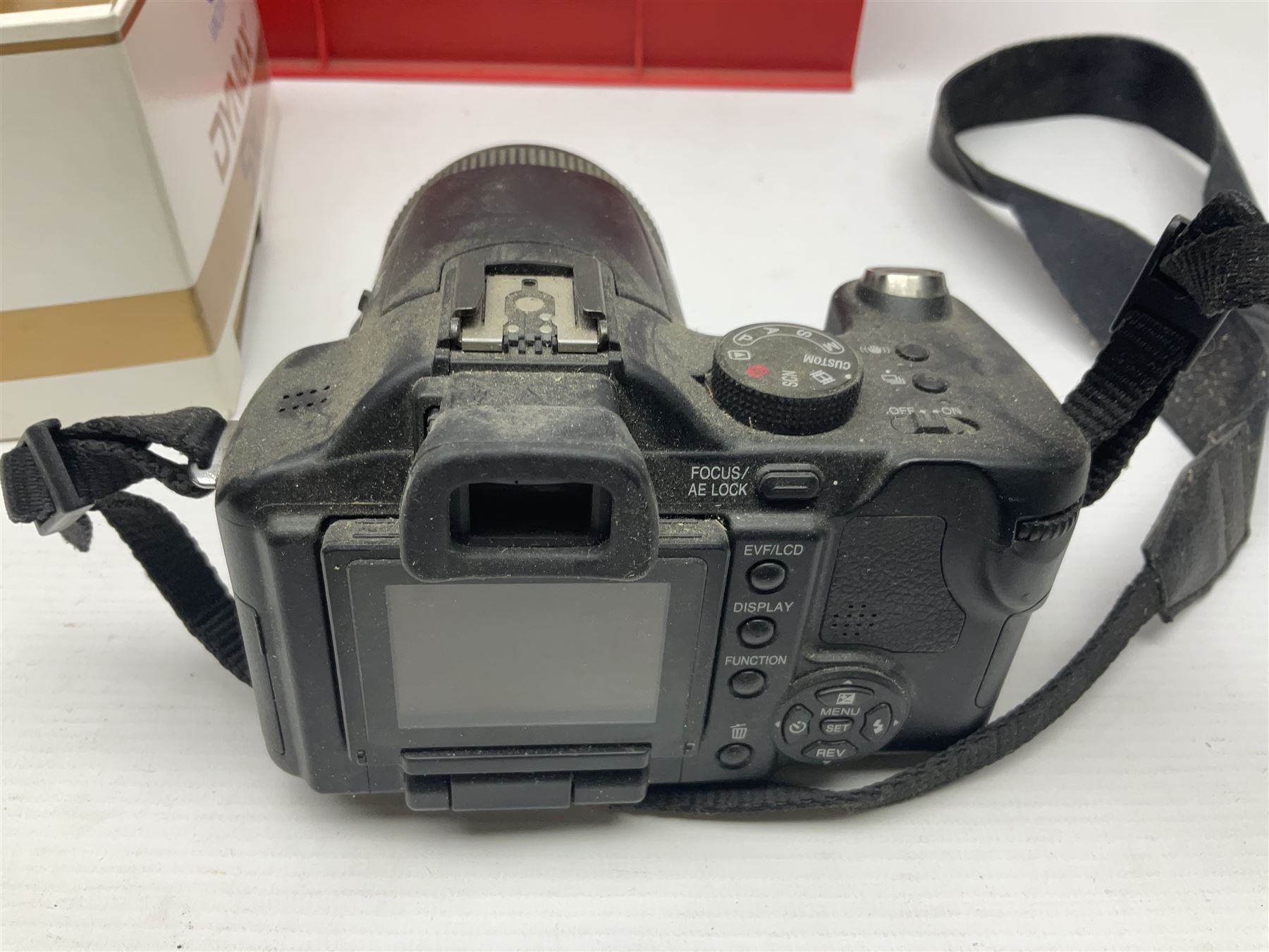 Minolta Dynax 5xi camera body serial no 17222646 with 'AF Zoom Xi 28-80mm 1:4(22)-56' lens serial no 17220881, Minolta SRT101 camera body serial 1944687, Lumix camera body serial no K6SC10168 etc 