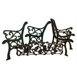 Pair cast iron garden bench ends decorated with scrolling design (H83cm), another pair of cast iron bench ends (H78cm), and a cast iron bench back decorated with foliage branches and roses (W110cm x H30cm)
