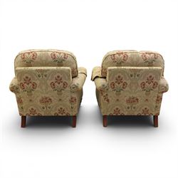 Parker Knoll - 'Henley' floral fabric living room suite, comprising a two seat sofa and pair of armchairs, raised on dark stained turned feet raised on brass castors

Armchairs (H 99cm, W 95cm, D 100cm)