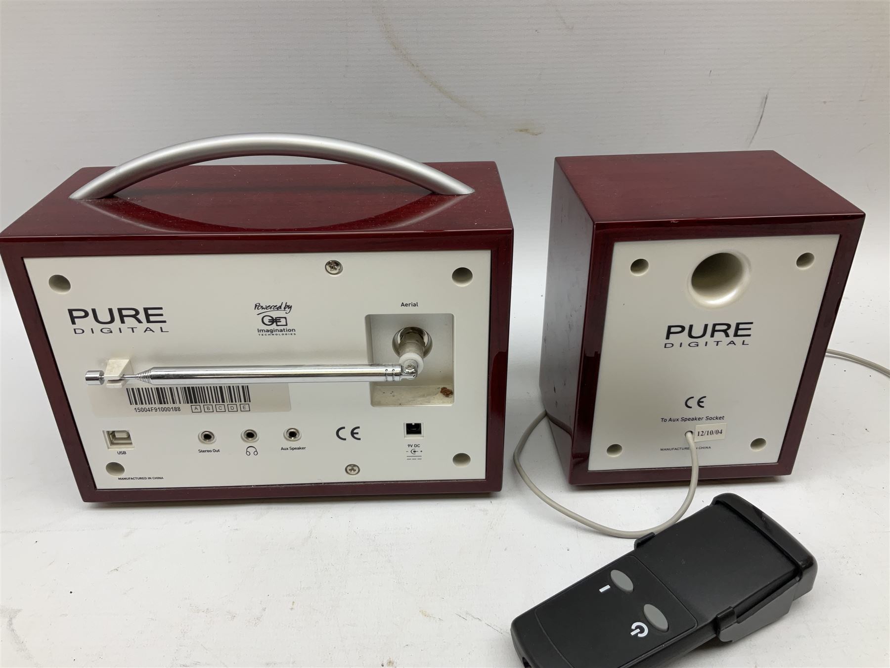 Pure Digital Evoke-1XT DAB digital radio and additional speaker, together with Quartz mantel clock