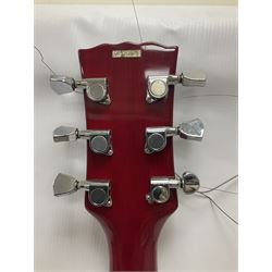 Vintage VS6M Reissued Series six string electric guitar, with solid body in cherry red finish, in carrying case, guitar L103cm