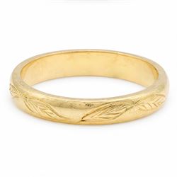 18ct gold wedding band with leaf engraved decoration 