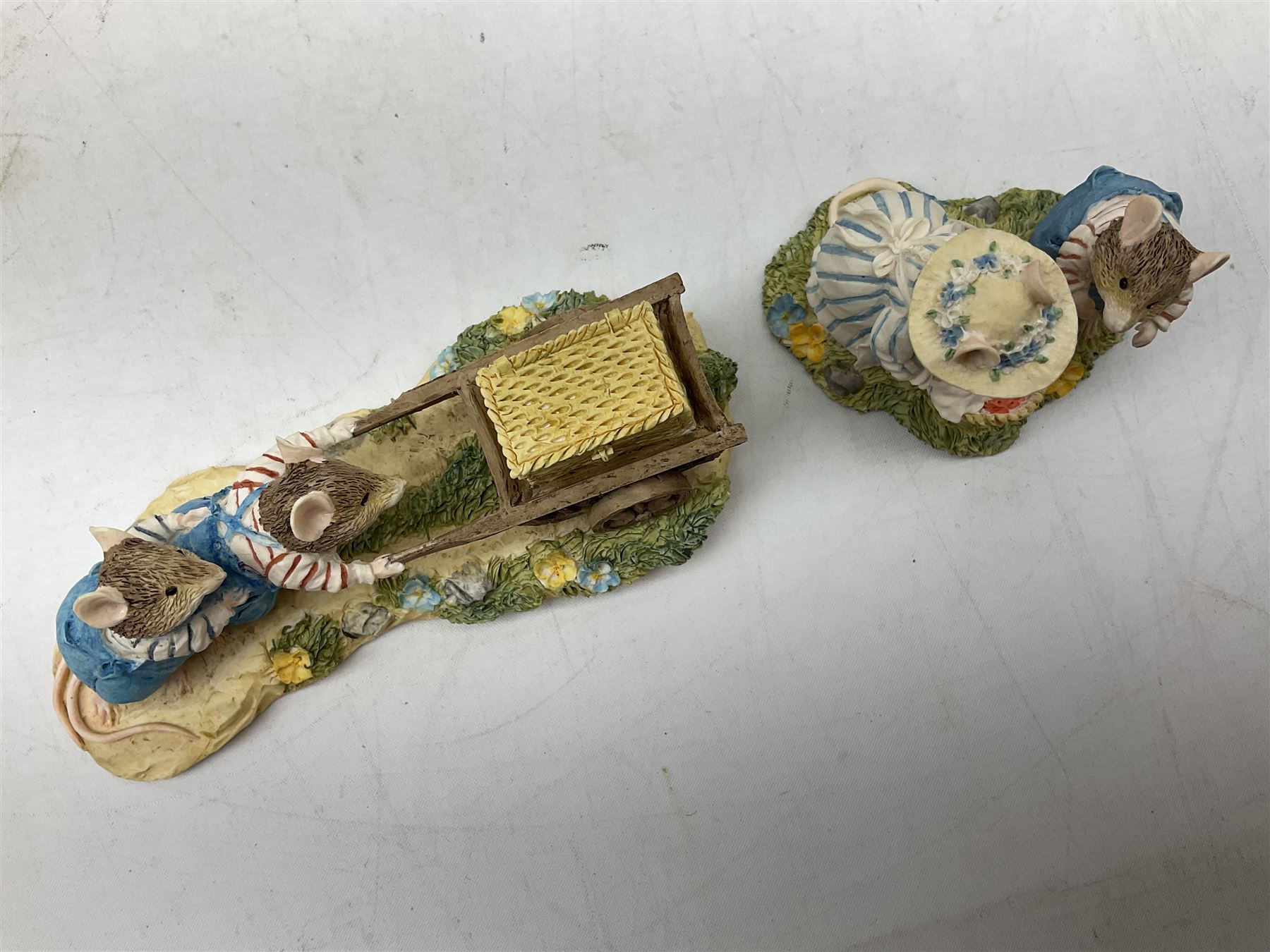 Four Classic Collectables Brambly Hedge figures, comprising Basil Pouring Drinks, Wilfred and Teasel Pushing Cart, Poppy Carry Pails and Mrs Apple, Wilfred and Basket, all boxed