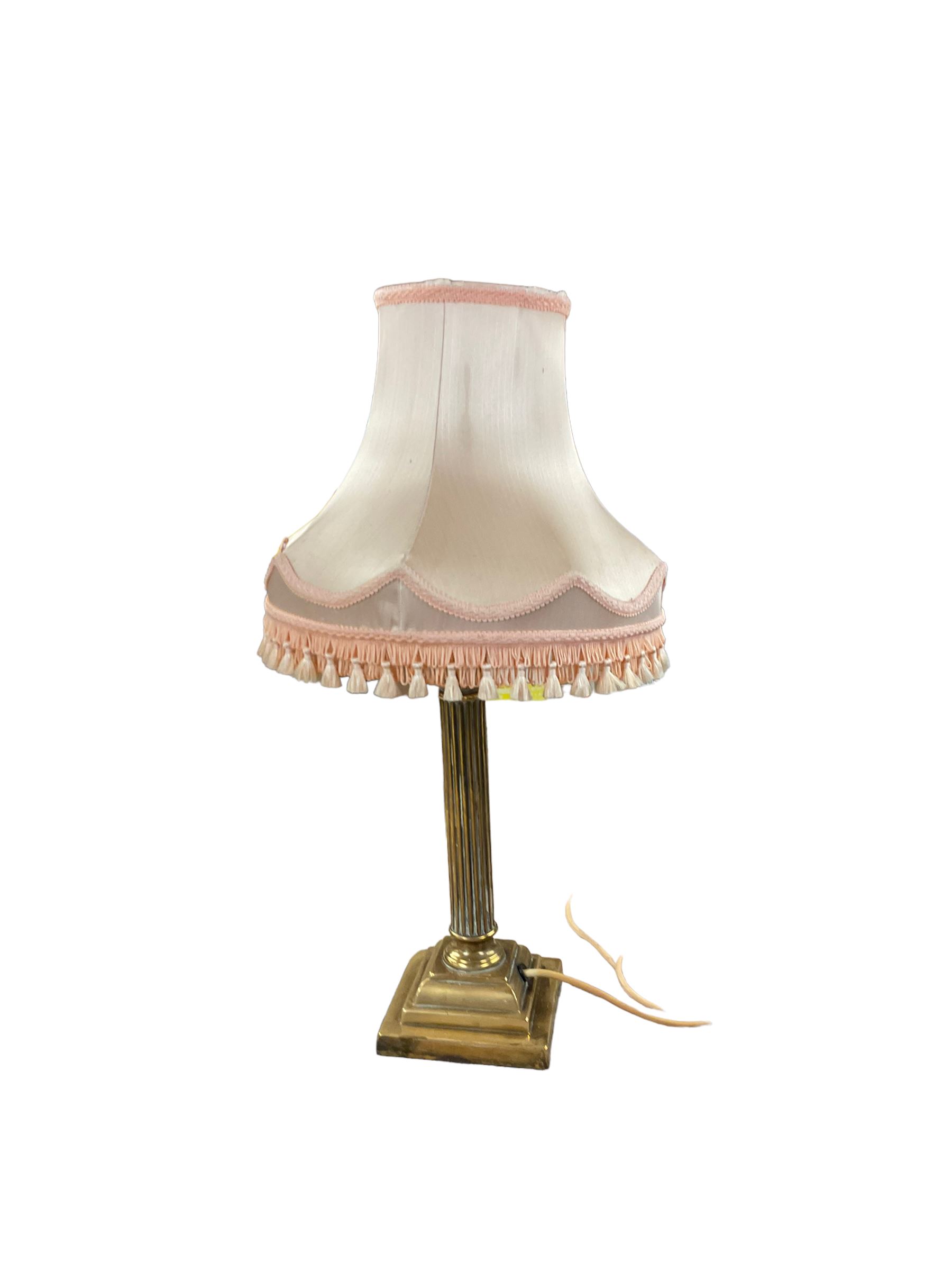 Cased Singer sewing machine, with two table lamps including a brass corinthian column example