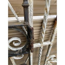 Two wrought iron garden gates painted in black and white - THIS LOT IS TO BE COLLECTED BY APPOINTMENT FROM DUGGLEBY STORAGE, GREAT HILL, EASTFIELD, SCARBOROUGH, YO11 3TX