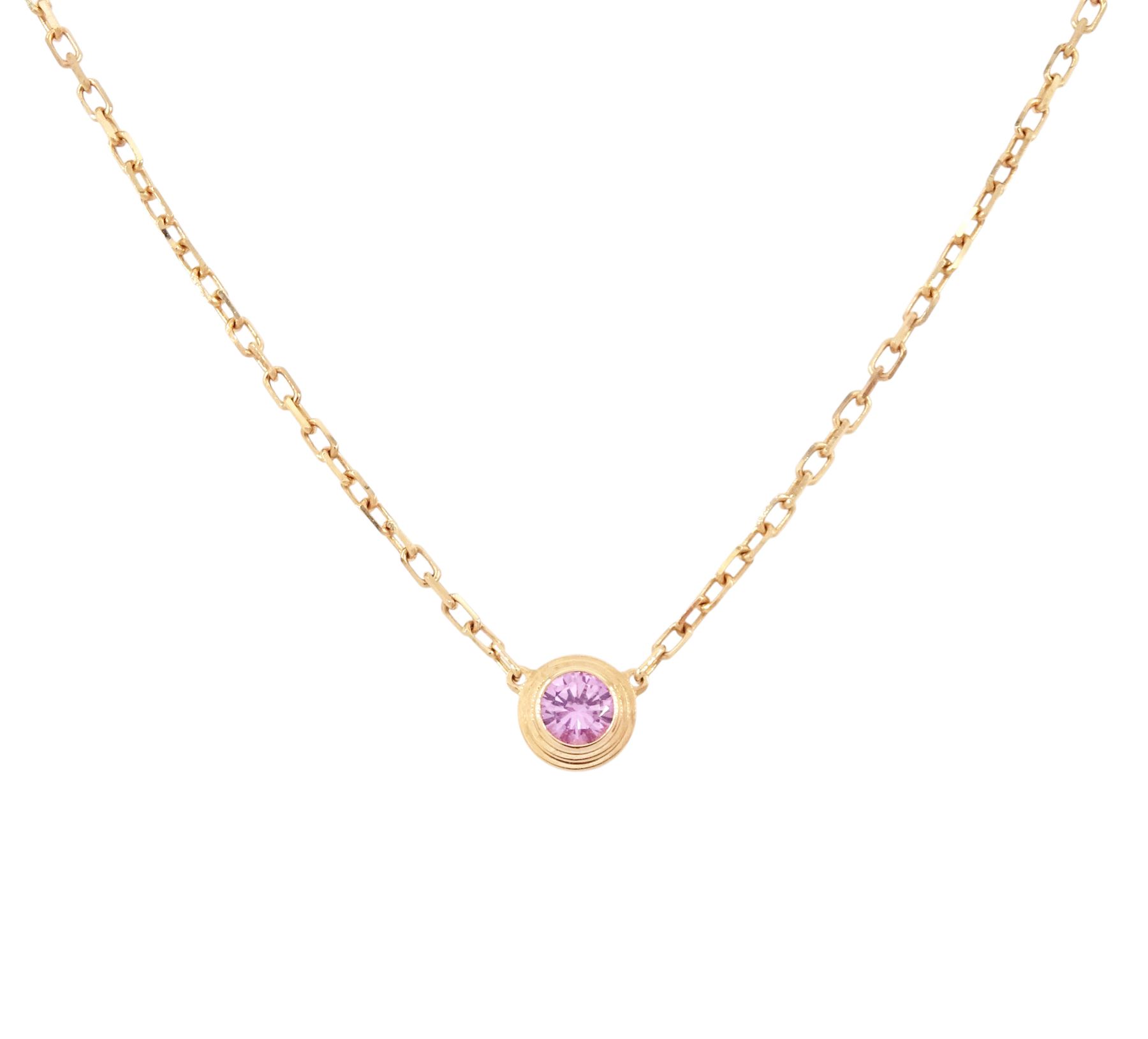 Cartier d'Amour 18ct rose gold pink sapphire pendant necklace, bezel set with a single round cut sapphire of approx 0.15 carat, boxed with certificate