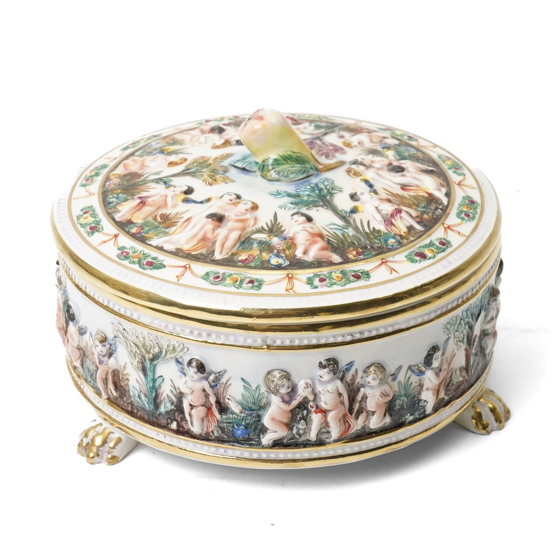 Capodimonte vase and cover decorated with a raised pattern of cherubic figures H32cm, another vases and cover with panels of figures H33cm, bowl and cover with similar decoration D20cm and two other Capodimonte pieces (5)