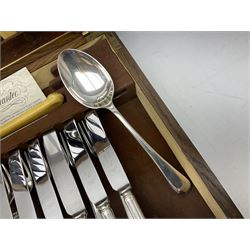 Twelve place setting canteen of cutlery by Lee & Wigfull Ltd, cased in an oak  chest, with key, meat carvers are missing, H18cm, L44cm 