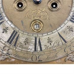 William & Mary floral marquetry 8-day longcase clock c 1700, later mid-18th century four pillar rack striking movement with a square brass dial and subsidiary seconds dial, ringed winding holes and calendar aperture to the matted dial centre, with London cherub head cast spandrels and (later) fretted steel hands, silvered Roman numeral chapter ring with stylised fleur di Lis half hour makers, narrow Arabic five-minutes, minute track and inner quarter hour track, signed Thomas Horlock, Hammersmith, 
case with box upstand to the domed floral marquetry decorated caddy with three brass flame finials, above a moulded cornice and fretwork frieze,  inlaid hood door with attached barley twist pillars to the front above an inlaid convex moulding, full length D moulded trunk door with a circular lenticle inlaid with floral and foliage panels inhabited with birds, on a conforming marquetry plinth with applied double skirting. Thomas Horlock is recorded as a Whitesmith & Clockmaker of Hammersmith, Middlesex.
A copy of Thomas Horlock's will dated the 15th June 1757 is held at The National  Archives Kew.