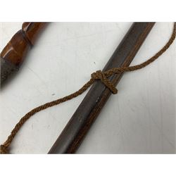 Tribal Art - an African axe, possibly Yoruba, the bone shaft carved as two cord bound stylised figures with iron fan-shaped blade, L35cm overall; and 19th century harpoon or spear head of square section with two long fixing arms on cut-down ash shaft L57cm (2)