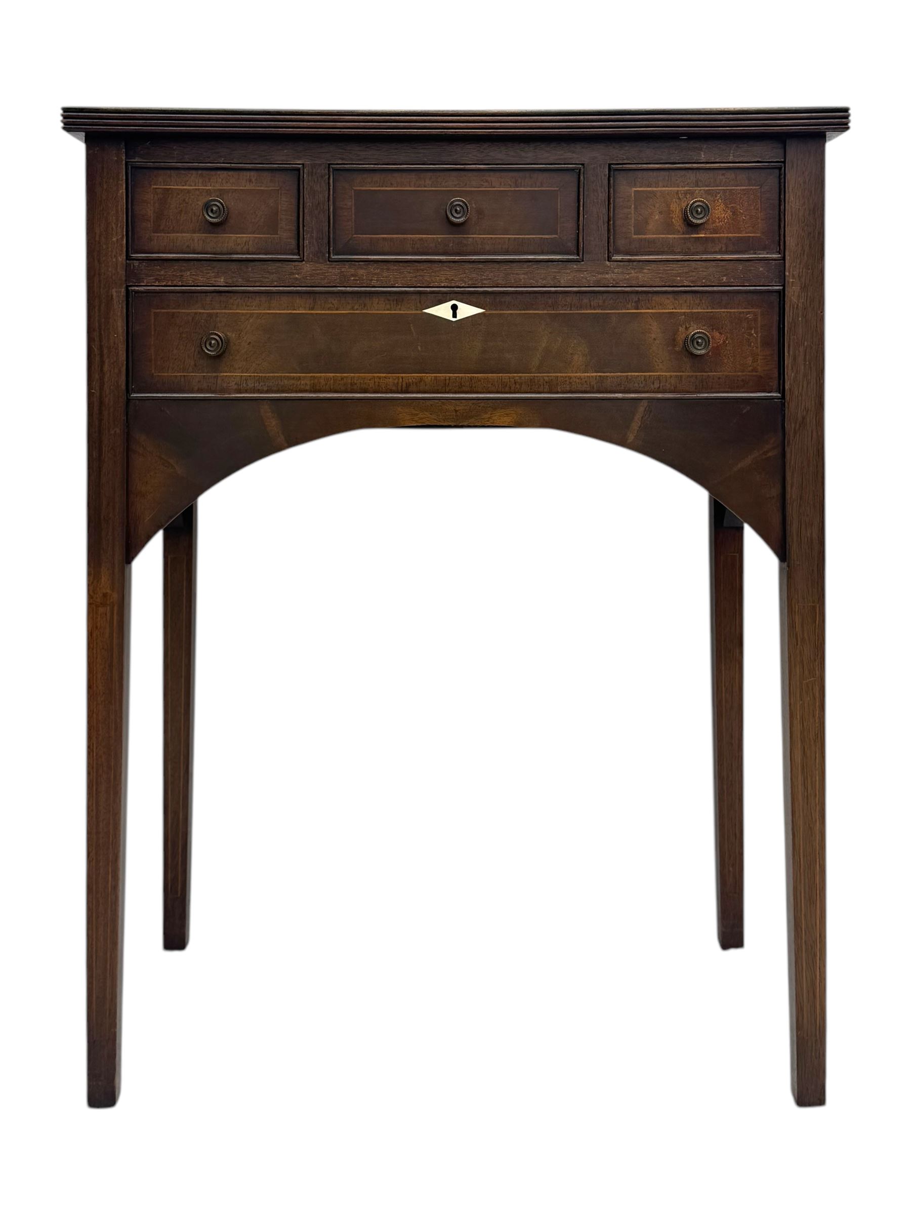 Georgian design inlaid mahogany side table, rectangular top with fluted edge over three short and one long drawer, arched apron, raised on slender supports 