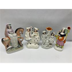 Collection of Victorian and later Staffordshire style figures, to include Queen Mary on horseback, child riding a goat, spill vases, the royal children etc, Queen Mary H26cm 