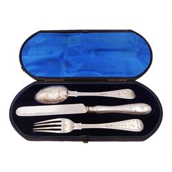 Victorian silver cutlery set, comprising knife, fork and spoon, all profusely engraved with flower heads, each with initials terminals, hallmarked Chawner & Co Birmingham 1877, contained within tooled leather, velvet and silk lined fitted case