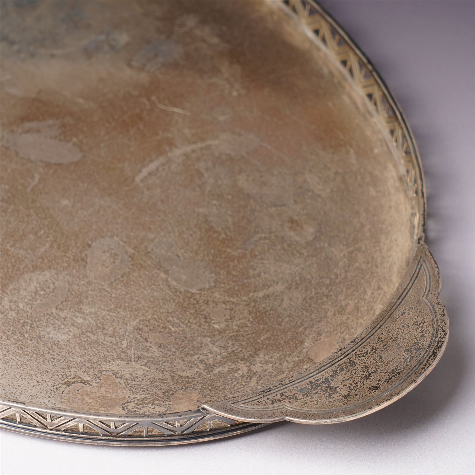 Silver oval tray with pierced rim and flattened handles W47cm Sheffield 1934 Maker Mappin & Webb