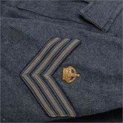 WWII Royal Air Force battle dress blouse, belonging to Flight Sargent Colin Scott 3011422, dated 1945, tailors label for M & N Horne Ltd 1945, Size No 7, blue cloth, Signaller cloth brevet, wireless officers patch to right sleeve and braid sergeant stripes to both sleeves, together with his flight log book, postings & Movements, Royal Air Force Service and Release Book, photographs etc  