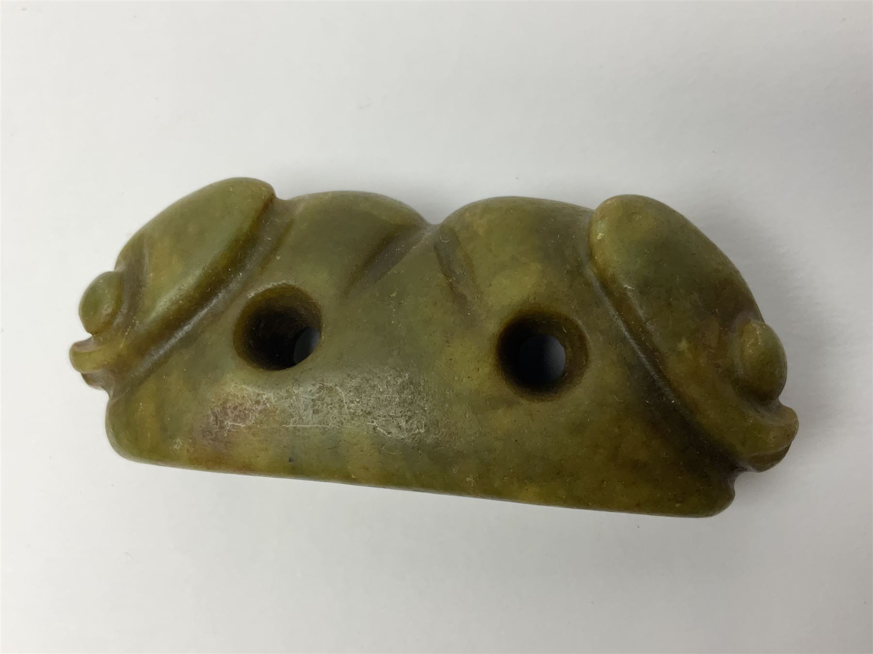 Chinese hardstone carving of a fish amongst coral, with platted rope handle, together with other hardstone and soft stone carvings  