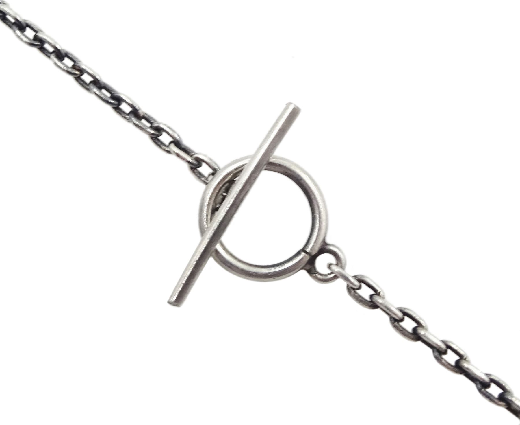 Silver double dolphin pendant necklace designed by Arno Malinowski for Georg Jensen, No. 94