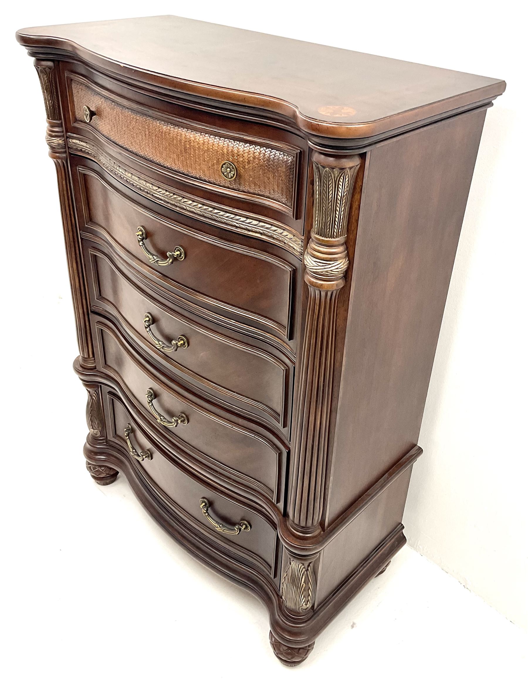 Kevin Charles American walnut serpentine chest, five graduating drawers
