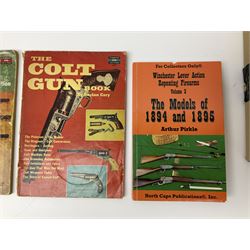 Six books on handguns/pistols comprising David R. Chicoine: Smith & Wesson Six Guns of the Old West.2004; Chris C. Curtis; Systeme Lefaucheux. 2002; Geoffrey Boothroyd: The Handgun. 1970; William Chipchase Dowell: The Webley Story. 1962; Derek Fuller: Muzzle Loading Pistols. 2002; and George Layman: The British Bulldog. 2006; and three other books on Colt and Winchester guns (9)
