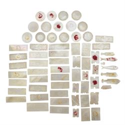 Chinese mother of pearl gaming tokens, of varying shape and design, including carved and engraved examples