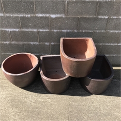  Three large 'D' shaped rustic frost proof pots (W51cm, H33cm, D61cm) and a similar bowl (D54cm, H40cm) (4)  