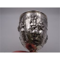 Victorian silver presentation goblet, chased and repousse decorated with military shooting scene, upon a beaded knopped stem and spreading circular foot with floral repousse decoration, the body with engraving 'Keighley 35th W.Y.R.V. All Comers Prize 1862 Won By Private Popplewell 37th W.Y.R.V.', hallmarked Robert Hennell III, London 1861