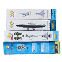 Four Cobi Bricks Armed Forces and Historical Collection model sets, comprising 1:144 scale no. 4852 U-Boot U-52 (Type VIIB), 1:48 scale no. 5900 Boeing F-15EX Eagle II, 1:48 scale no. 5848 Eurofighter and no. 5711 Junkers JU 52/3M, all in sealed boxes