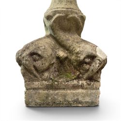 19th century weathered sandstone birdbath, the octagonal canted dished top raised on a ring turned flared pedestal, with four carved stylised dolphins to the squared base