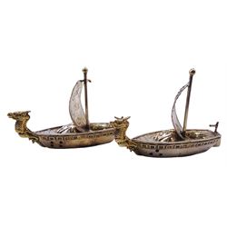 Pair of 20th century Japanese silver novelty cruets, modelled in the form of Viking long ships, marked Sterling Japan, contained within a fitted case, approximate silver weight 1.18 ozt (36.6 grams)