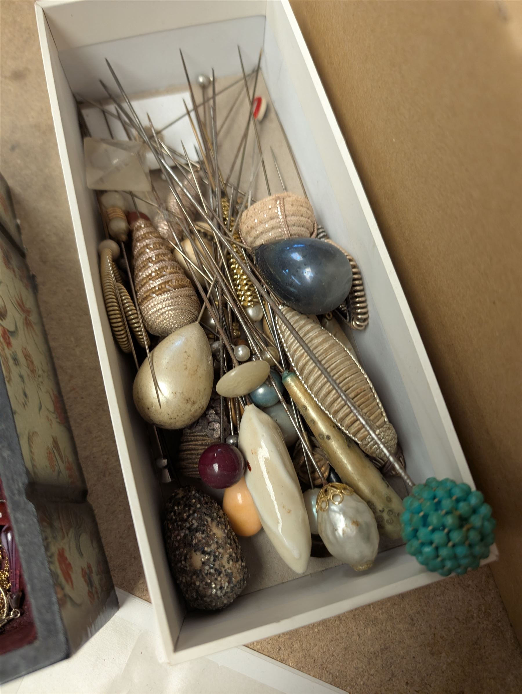 Colleciton of jewellery, including hatpins, brooches, silver earrings, etc