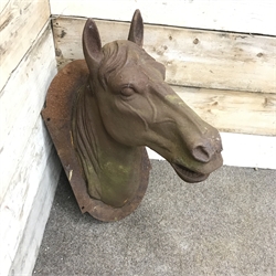 Large cast iron wall mounted figure of a horse's head, W37cm, H70cm