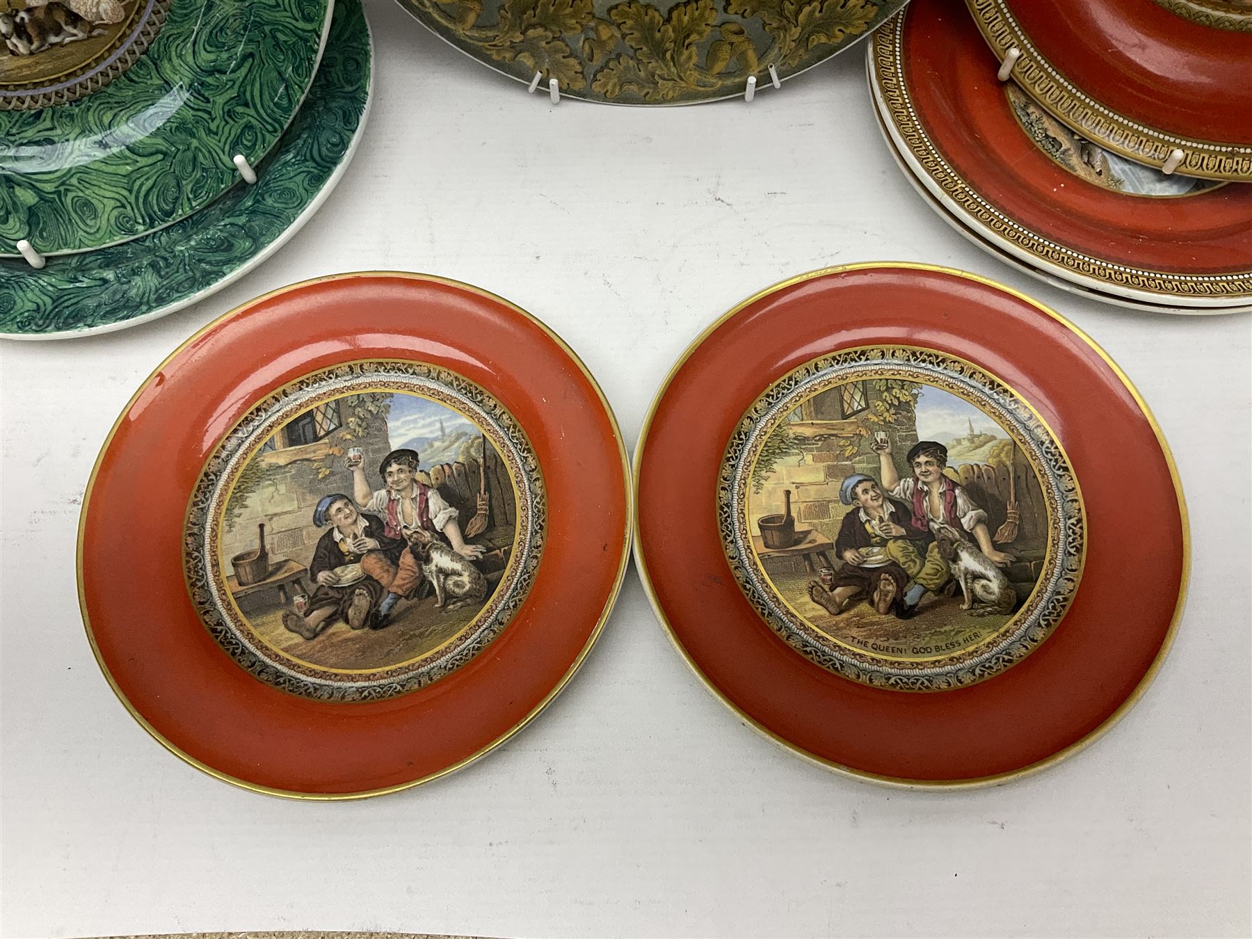 19th century Prattware table ware to include an oval footed dish decorated with a scene after Landseer 'Highland Music', retailed by James Muggleton L27.5cm, ‘The Truant’ plate after T. Webster, 'Blind Man's Buff' & 'Snap Dragon' tea plate, two side plates with malachite printed borders and others (17)