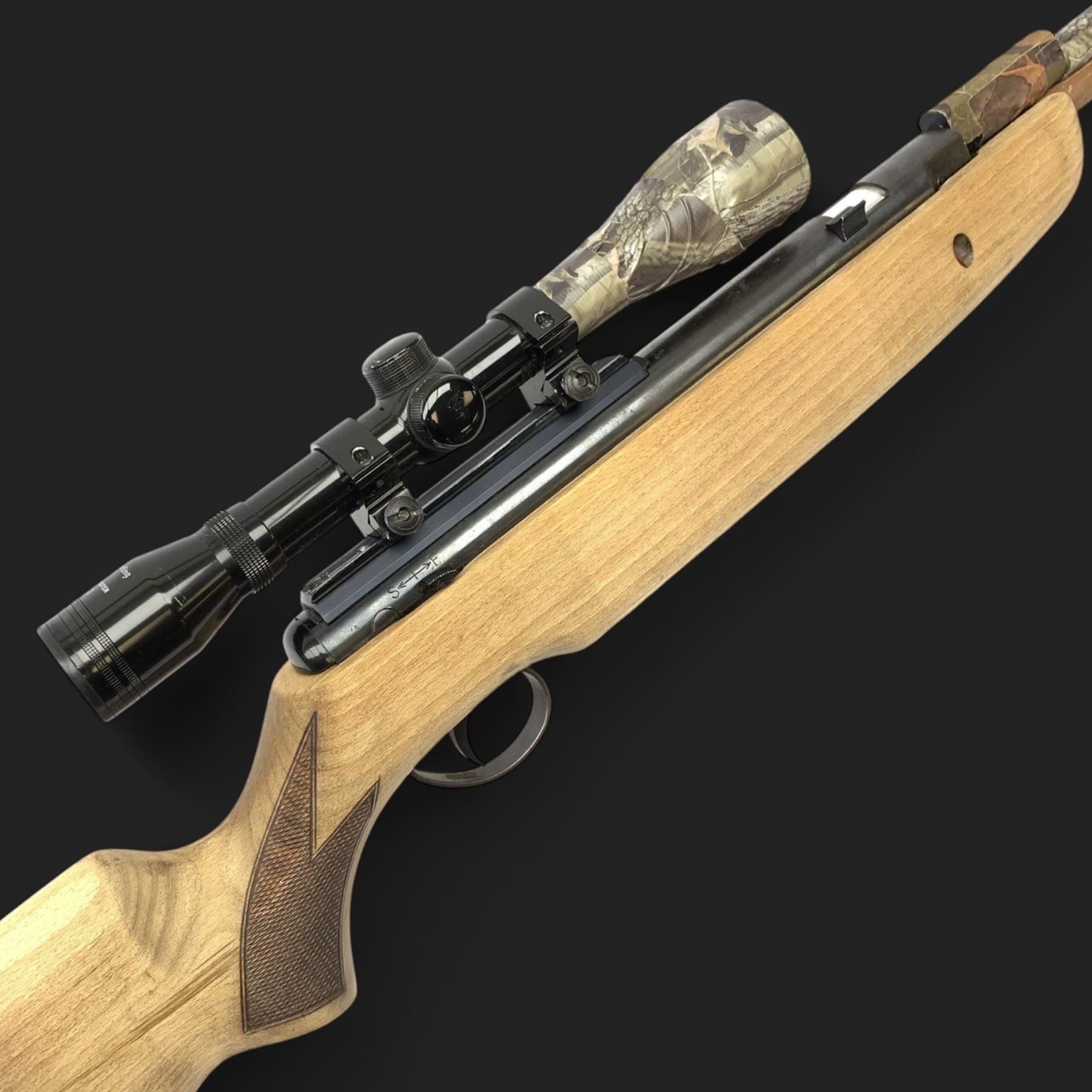 .22 air rifle with under lever action, chequered pistol grip, adjustable butt, camo covered barrel and Nikko Stirling 6x scope L120cm overall
