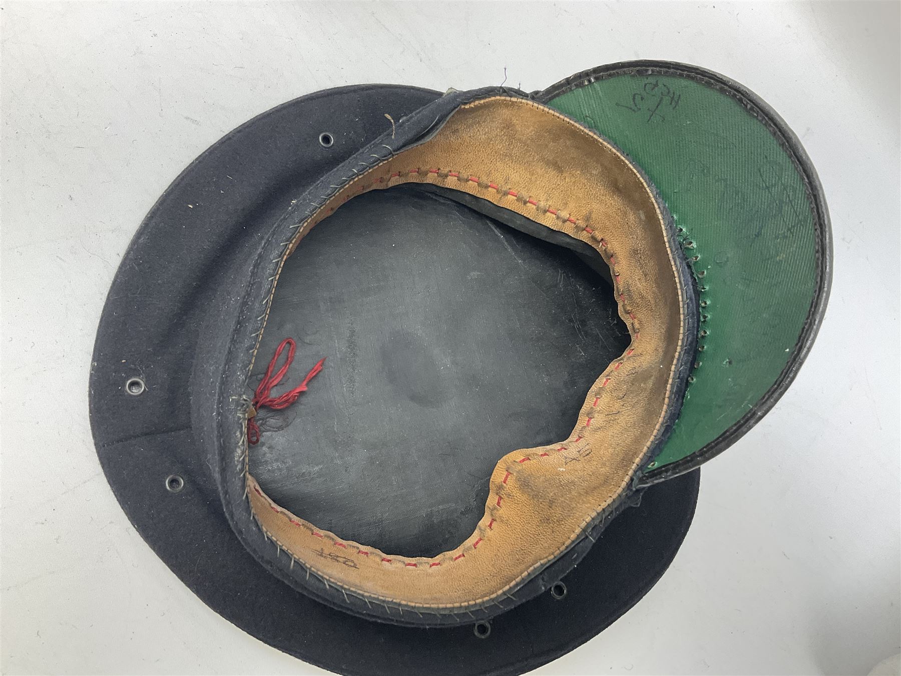 Hull City Police - helmet with king's crown night plate; two further ball-top helmets with Queen's crown plates; and a peaked cap (4)