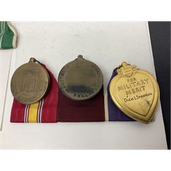 Nine American medals comprising Legion of Merit, Distinguished Flying Cross, Purple Heart named to Dick L. Sparman, Navy Good Conduct Medal, National Defence Service Medal, Army Commendation Medal, two WWII Victory Medals and China Medal; all with ribbons (9)