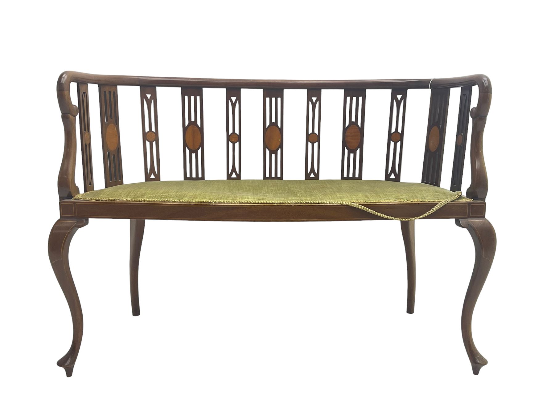 Edwardian inlaid mahogany salon settee or bench, the pierced and inlaid splat back over serpentine front, seat upholstered in laurel green velvet, raised on cabriole supports with satinwood stringing
