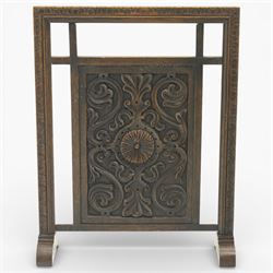 20th century carved fireside accessories; a carved coal bucket with metal liner and a carved fire screen