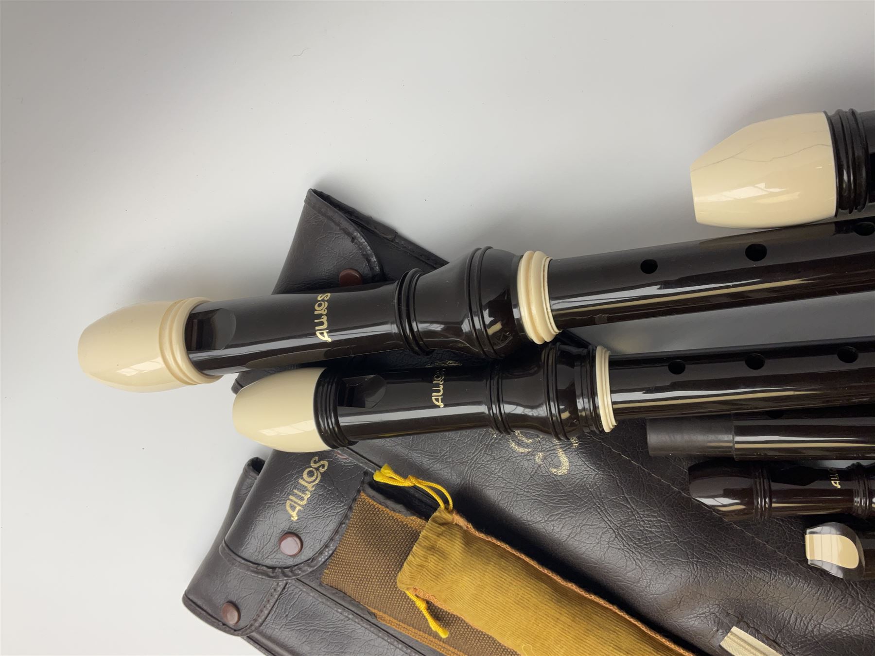 Set of four Japanese Aulos recorders including Soprano, largest 63cm