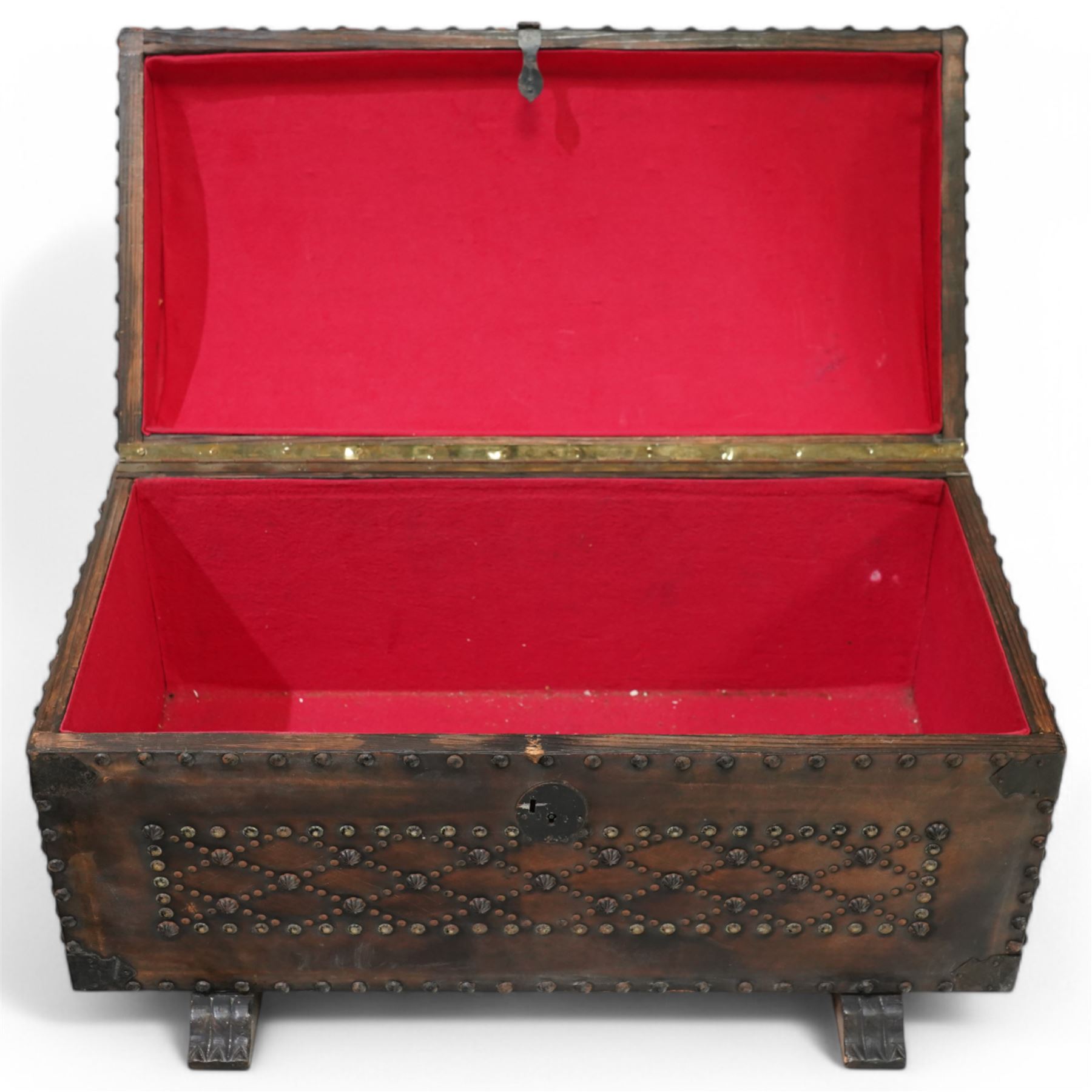 Studded leather dome top trunk, the hinged lid and front decorated with cross pattern in studs, on sledge feet 