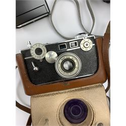 Vintage cameras lenses and accessories including Olympus 'OM10' camera body, Olympus 'OM4' camera, 'Olympus OM-System Zuiko auto-zoom 35-70mm 1:4' lens, various other lenses, tasco binoculars etc, in one box