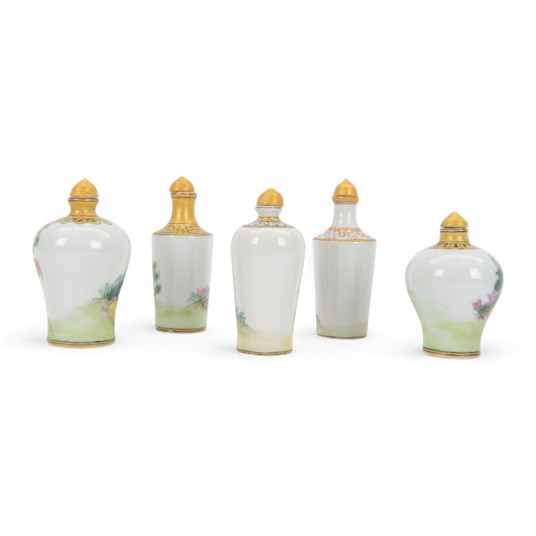 Five Chinese ceramic snuff bottle with painted erotic scenes, all with gilt painted stoppers, with character marks beneath, H10cm 