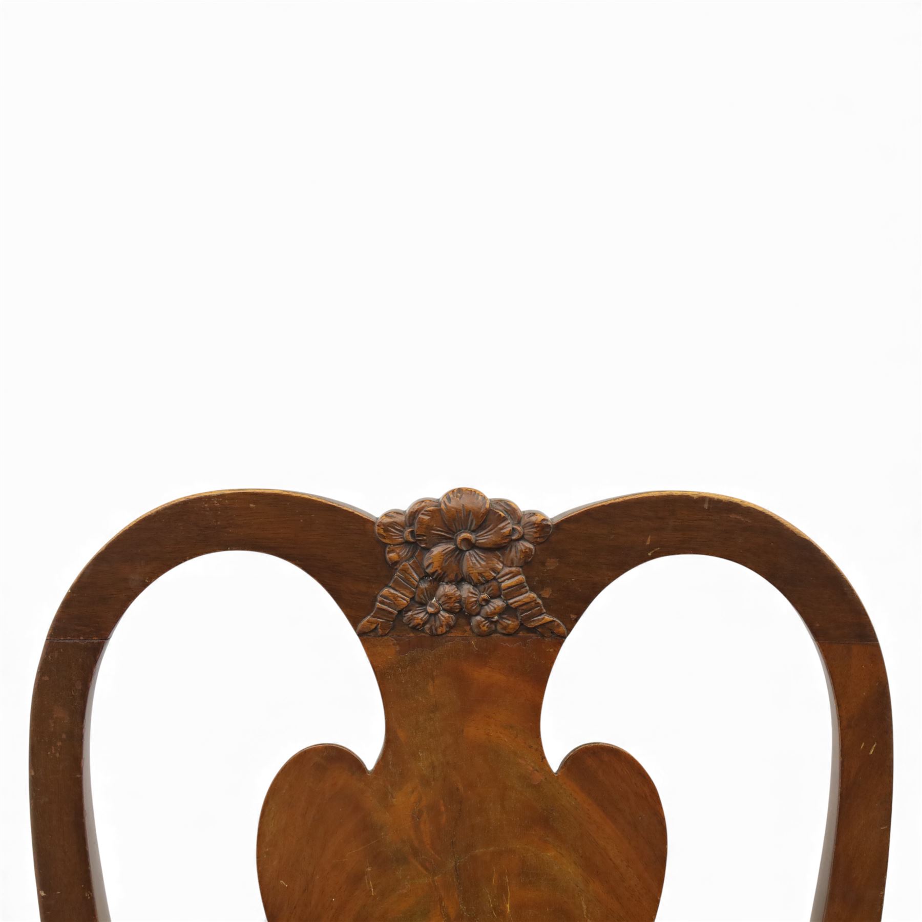 Queen Anne design walnut dining suite, comprising a rectangular dining table with carved moulded edge and rounded corners, raised on cabriole legs terminating in pad feet, together with a set of six matching dining chairs, each with shaped splat back, leather upholstered seat and cabriole supports (Extends to 230cm)