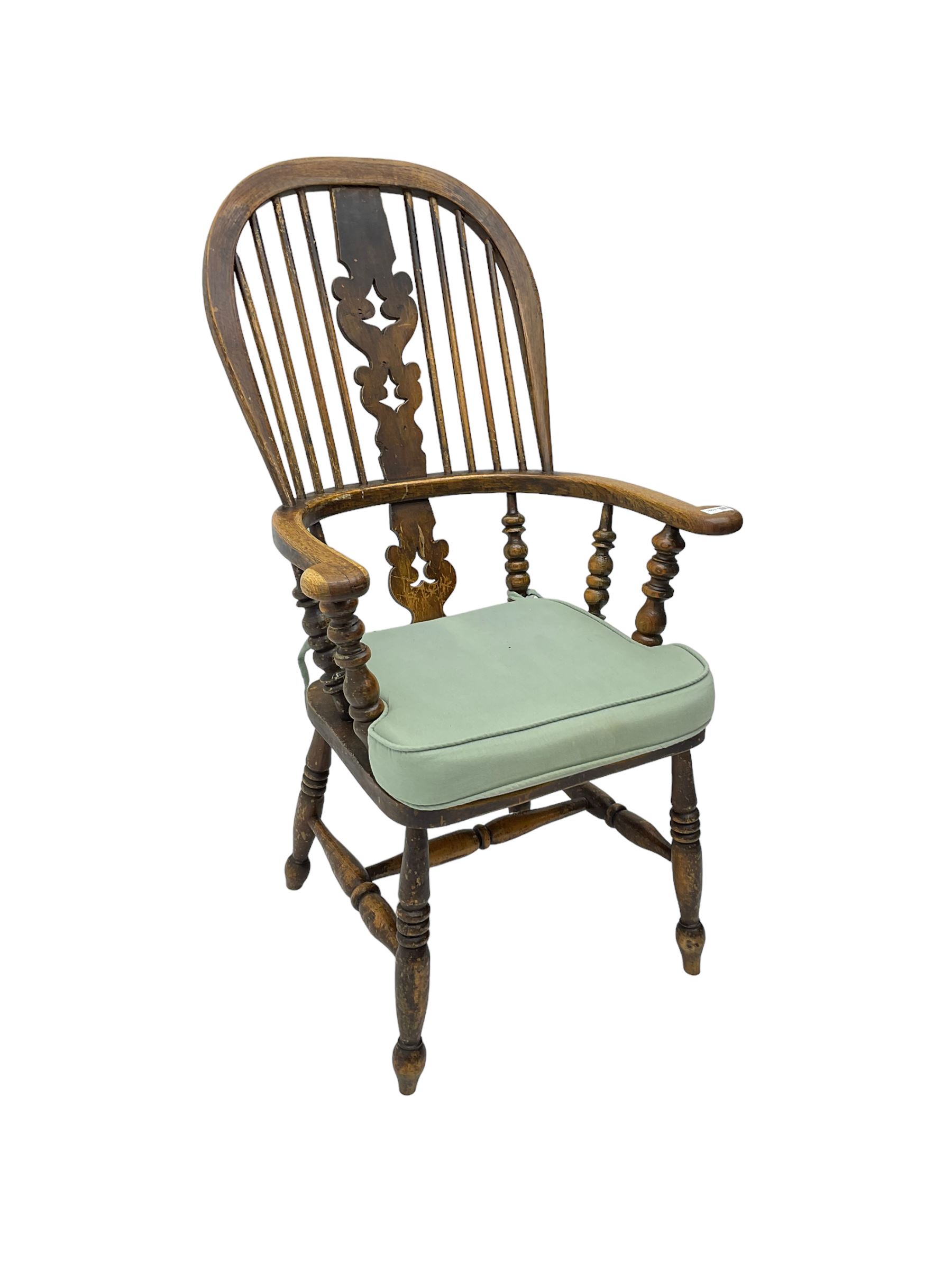 Late 19th century Yorkshire Windsor armchair, high stick back with pierced and fretwork splat, turned supports joined by H-stretcher
