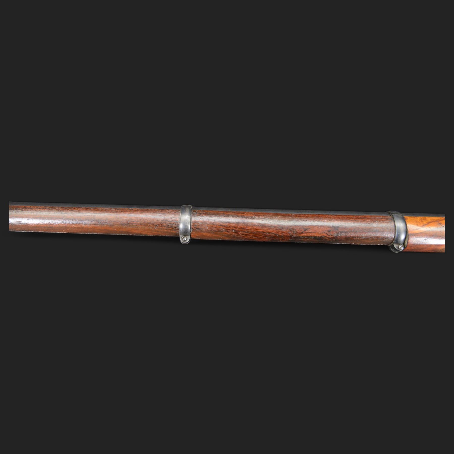 Enfield .577 action rifle, the 91.5cm rifled barrel with three barrel bands and ramrod under, full walnut stock, action marked 'Enfield' with Victoria cypher, overall L131cm