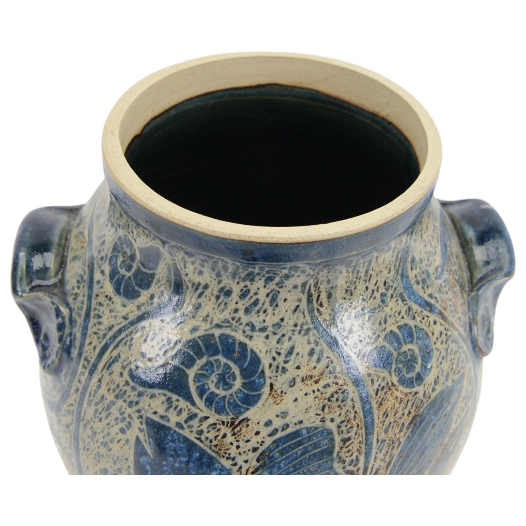 John Egerton (c1945-): studio pottery stoneware vase and cover, decorated with fish and ammonites upon a blue ground, H38cm