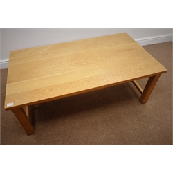  Light oak rectangular coffee table, square chamfered legs joined by stetchers, 125cm x 70cm, H46cm  
