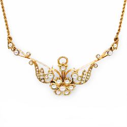 Edwardian gold pearl floral necklace, the openwork stylised floral and scroll mount set wi...