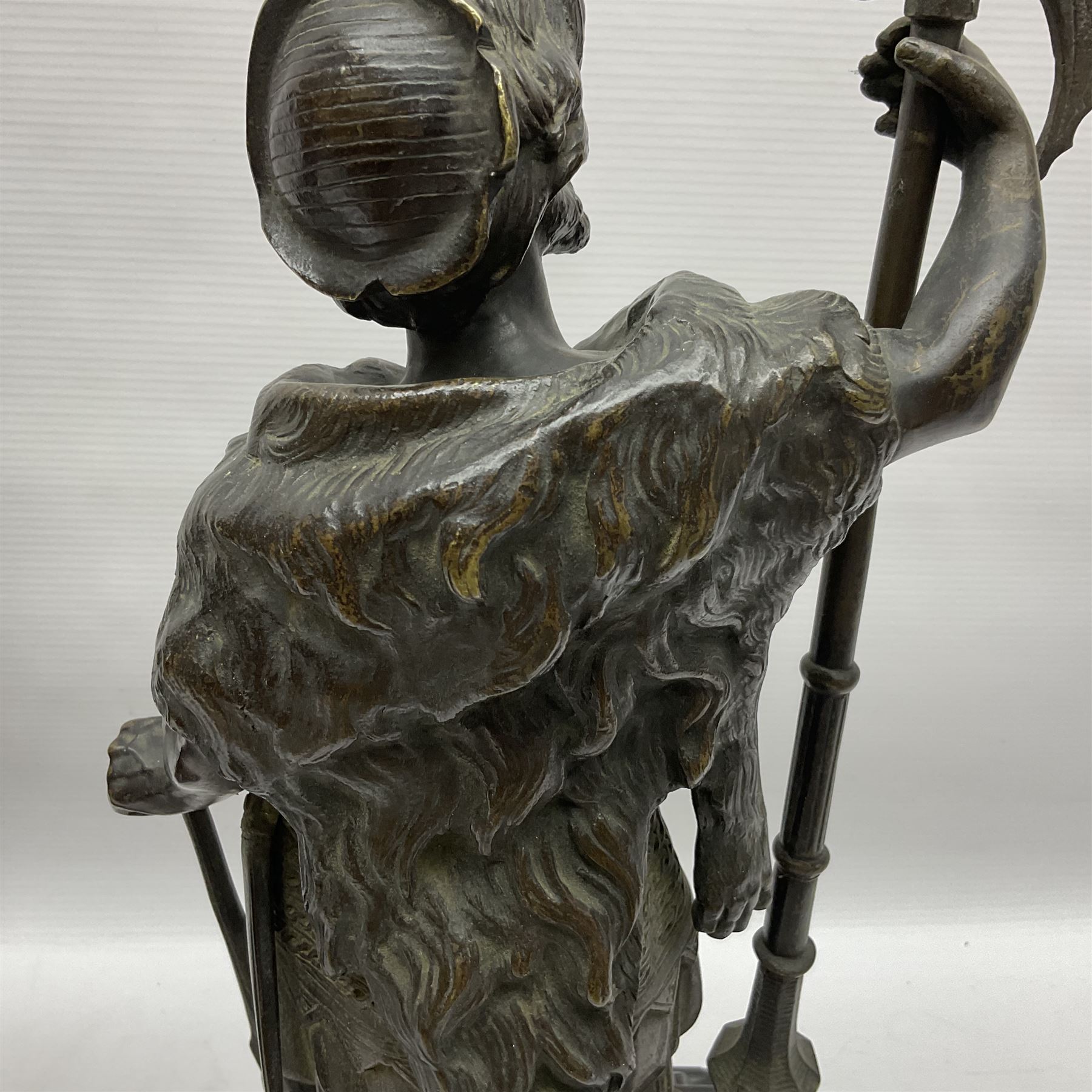 Pair of bronzed figure modelled as a hunter in traditional dress, each holding a pike, H48cm