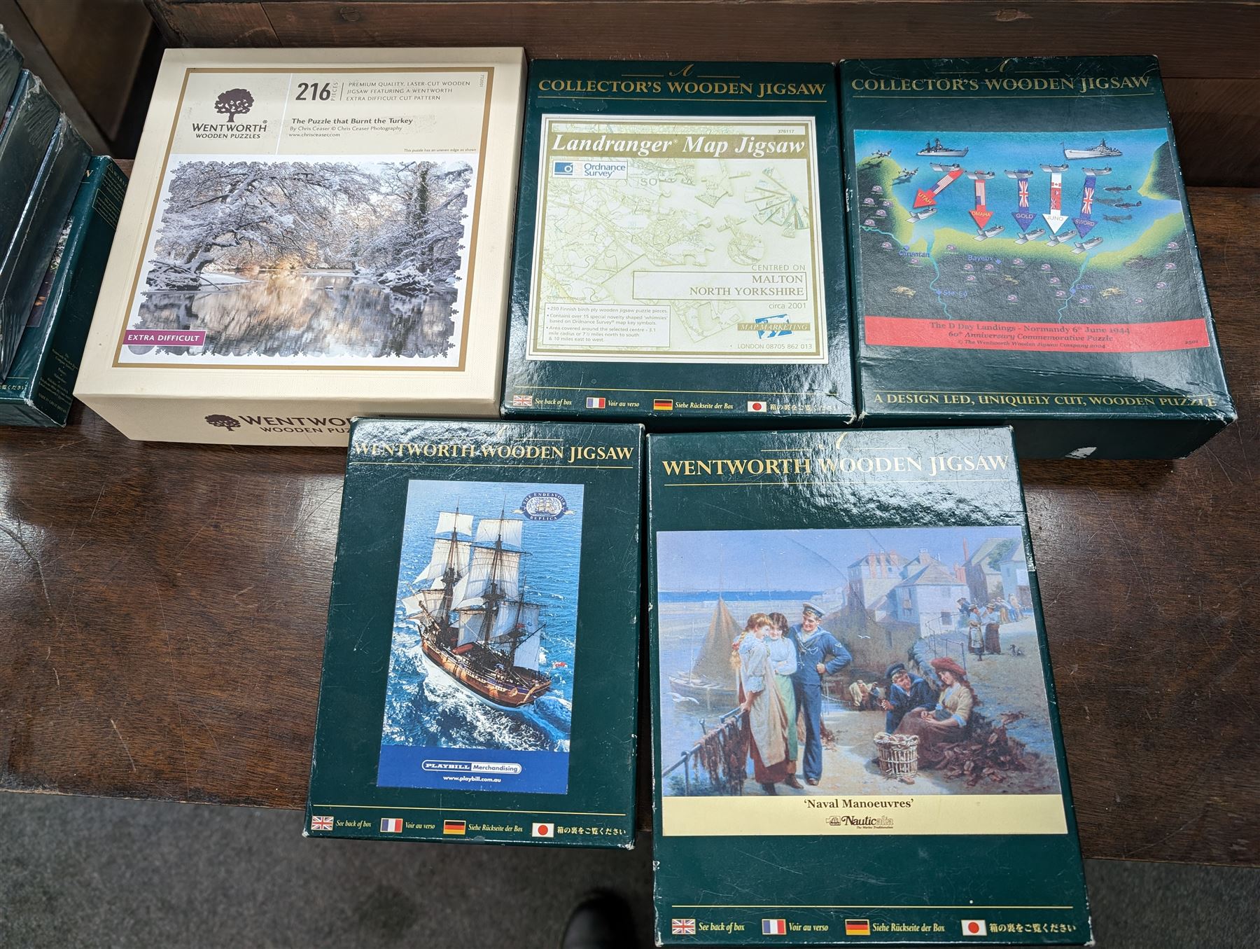 Chatsworth box easel, together with a Reeves table easel, collection of Wentworth jigsaw puzzles and two picnic baskets