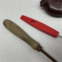 Two leather shot flasks with embossed decoration and brass nozzles; scissor action bullet mould with two ladles; pair of 19th century J.B. Warrilow hammer actions; small quantity of Staybrite buttons; and 1968 dated metal ammunition tin for 200 x 7.62 blank cartridges